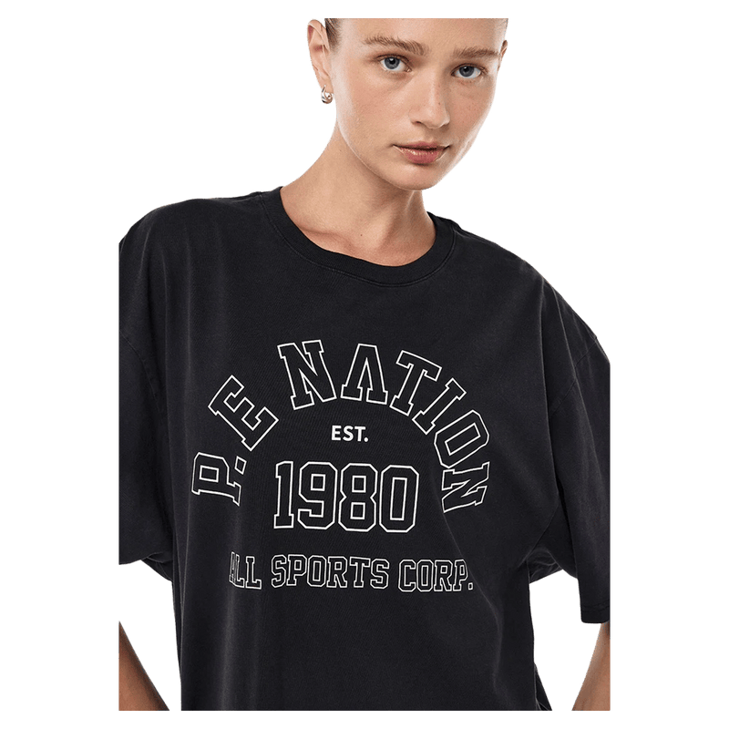 Close view of the PE NATION Altitude Tee Washed Black Tee,  26/27 Womens's model