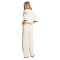 Side view of women wearing the Billabong Back To It Trackpants - Womens in Salt Crystal