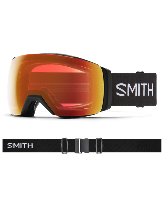 Smith I/O Mag XL snow goggles with red-orange mirrored lens, black frame, and adjustable black strap with white logo.