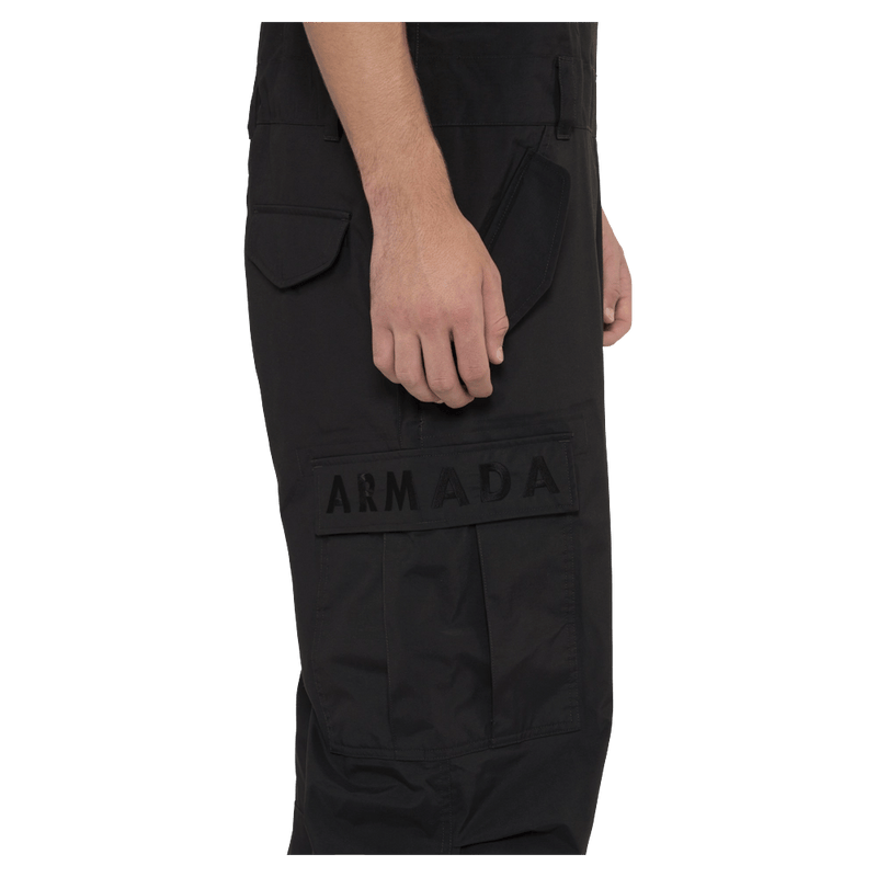 Side view of the Armada Sumpter 2L Bib in Black colourway, men's model