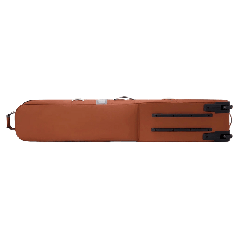 Back view of the Dakine Row Roller SB Bag in Spice colourway, unisex's model