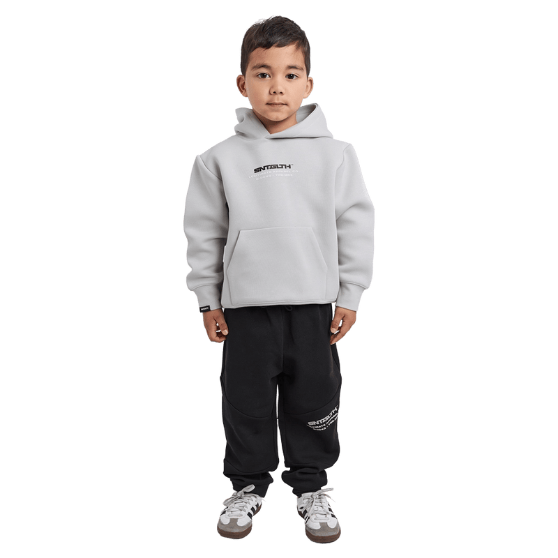 Full-body view of the St Goliath Freestyle Track Pant in Black colourway, toddler's model