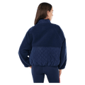 Back view of the PE NATION Technique Quilt  Dark Navy Jacket,  26/27 Womens's model