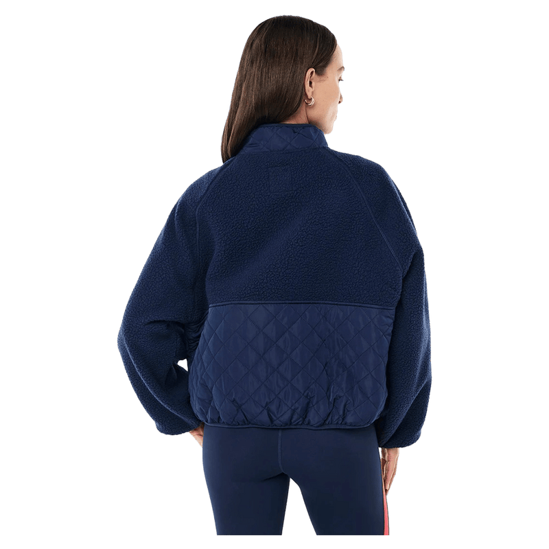 Back view of the PE NATION Technique Quilt  Dark Navy Jacket,  26/27 Womens's model