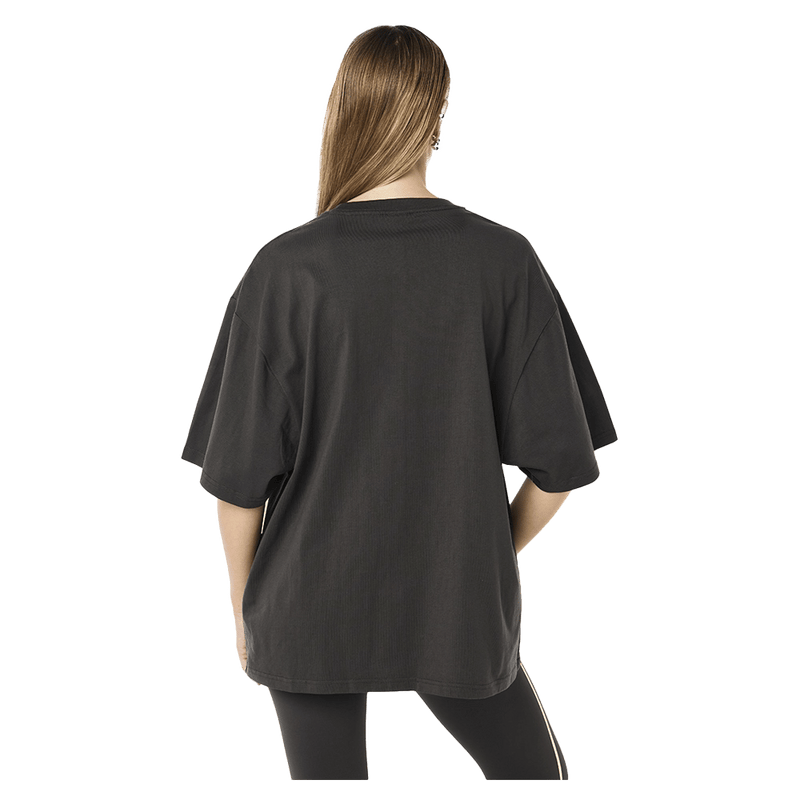Back view of the PE NATION Core Oversized Tee Caviar Tee,  26/27 Womens's model