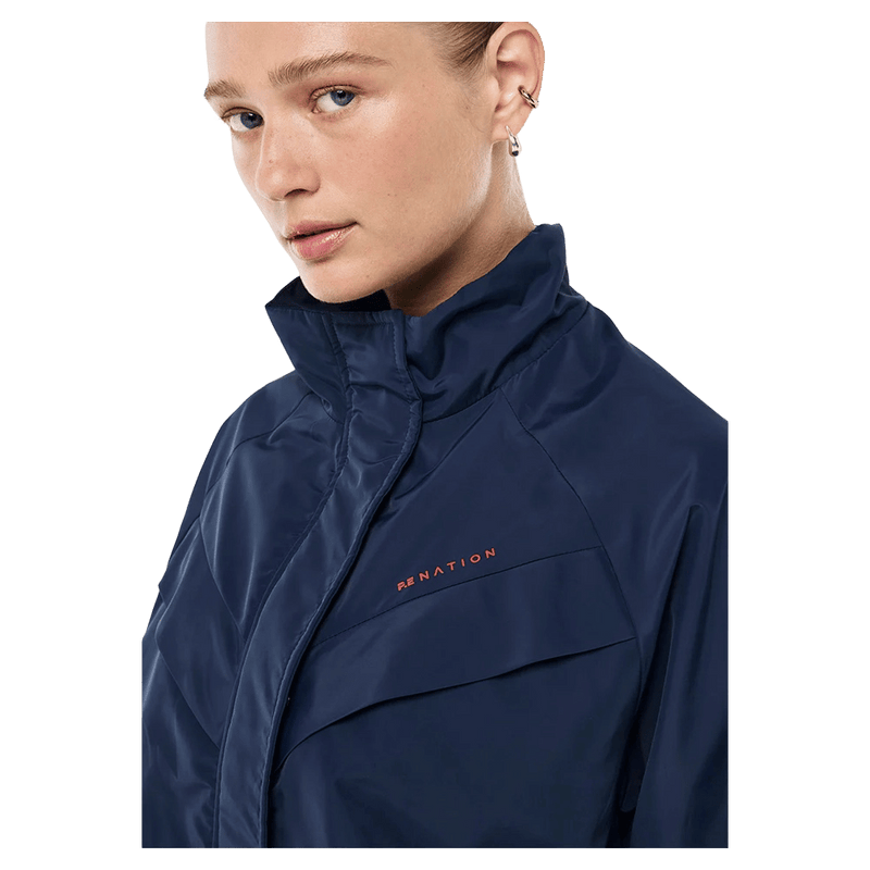 Close Side view of the PE NATION Shield Dark Navy Jacket,  26/27 Womens's model