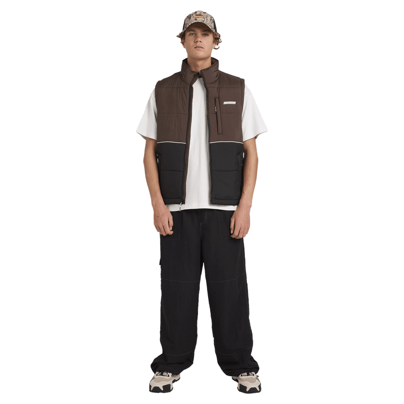 Front view of man wearing the Billabong Journey Puffer in Black
