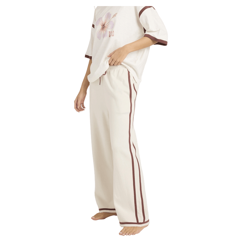 Side close view of women wearing the Billabong Back To It Trackpants - Womens in Salt Crystal