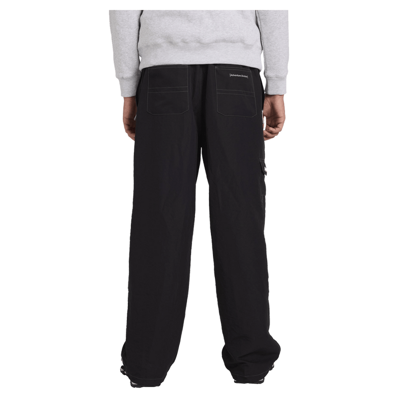 Back view of man wearing the Billabong Adiv Slant Pants in Black