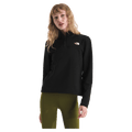 View of a woman wearing The North Face Cedar Trail Grid Fleece ¼ Zip Jacket for Women in Black featuring a quarter zip and embroidered white logo on the left chest