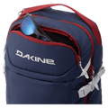 Pocket view of the Dakine Heli Pro 24L Backpack in NAVAL ACADEMY colourway, unisex's model