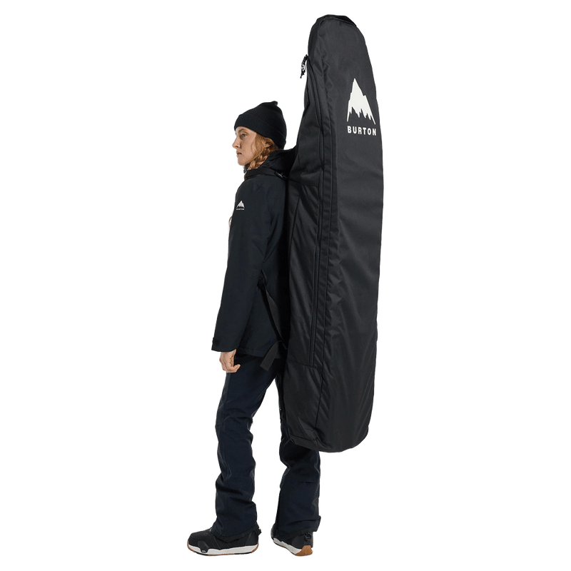 In action  view of the Burton Commuter Space Sack SB Bag in True Black colourway, unisex's model