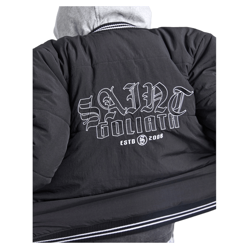 Close view of the St Goliath Global Bomber Jacket in Black colourway, kids's model