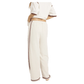Back view of women wearing the Billabong Back To It Trackpants - Womens in Salt Crystal