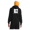 Rear view of a man wearing The North Face Evolution Box NSE Hoodie in Black featuring a box logo graphic in white and black.