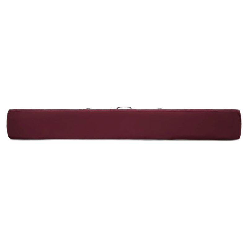 Back view of the Dakine Ski Sleeve Bag in PORT ROYALE colourway, unisex's model