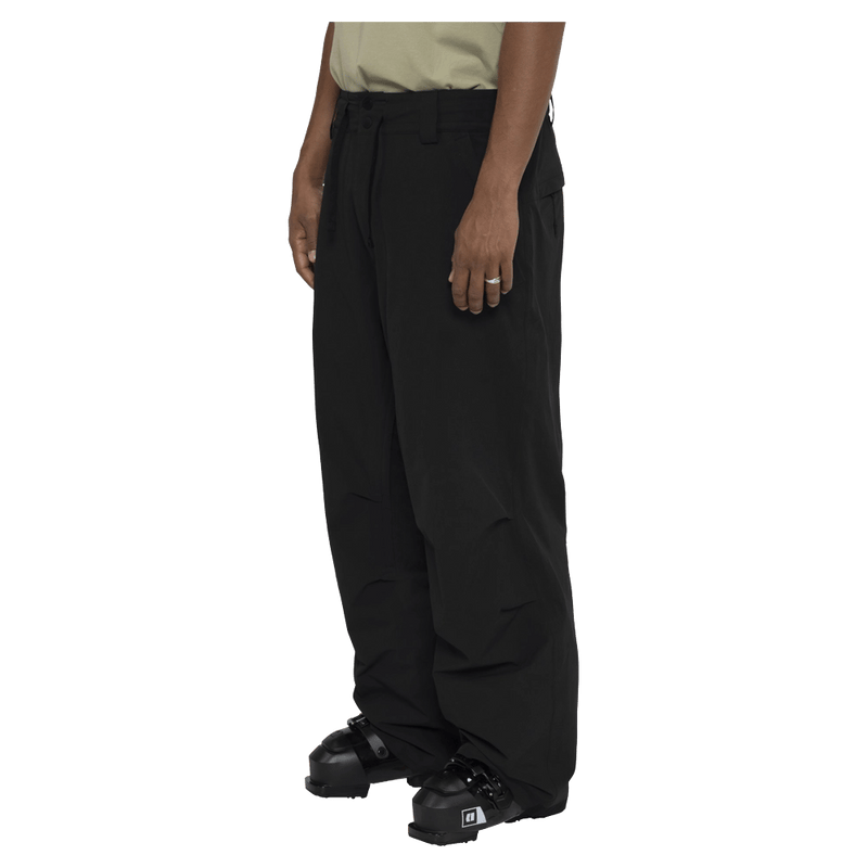 Side view of the Armada Chairman 2L Pants in Black colourway, unisex's model