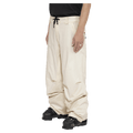 Side view of the Armada Chairman 2L Pants in Cream colourway, unisex's model