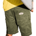 Rear cropped view of a man wearing the Bad Dog Workwear Shorts from Billabong in Dark Military. Featuring back patch pockets with logo and utility pocket on the side.