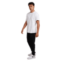 Full-body view of the St. Goliath Tech Track Pants in Black colourway, men's model