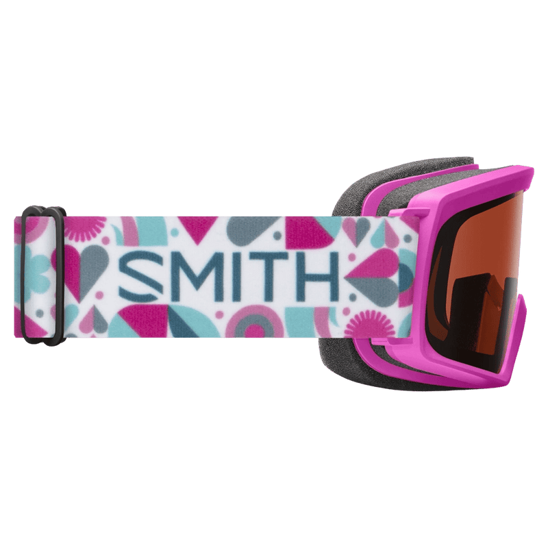 Side view of the Smith Rascal Goggles in Vivid Pink Hearts, RC36 lens, kids model