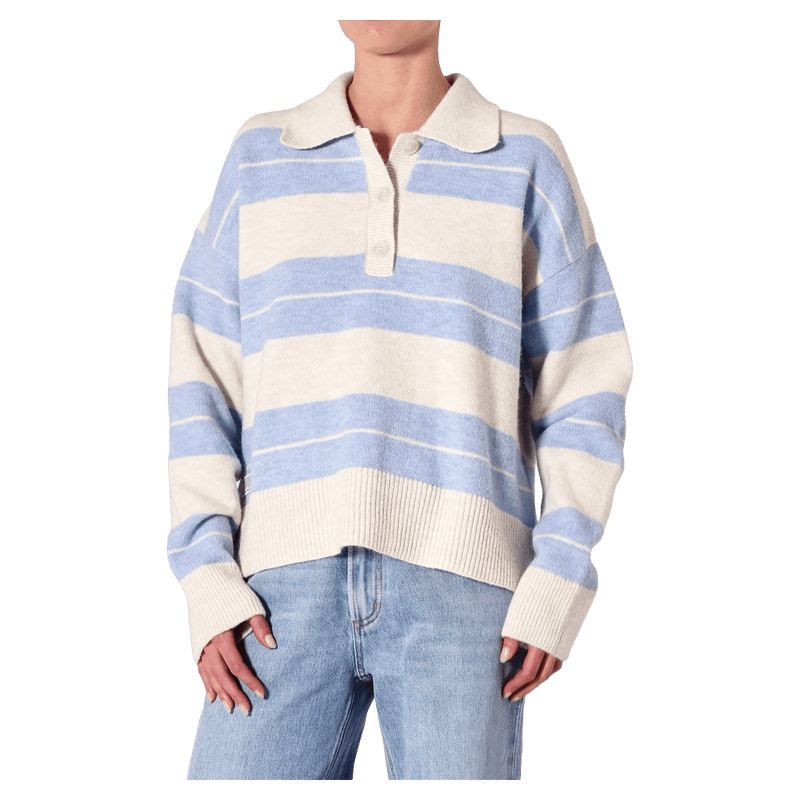 Front view of women in the Sofia Stripe Polo in colour Soft Blue
