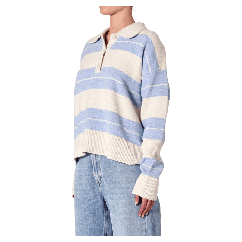 Side view of women in the Sofia Stripe Polo in colour Soft Blue
