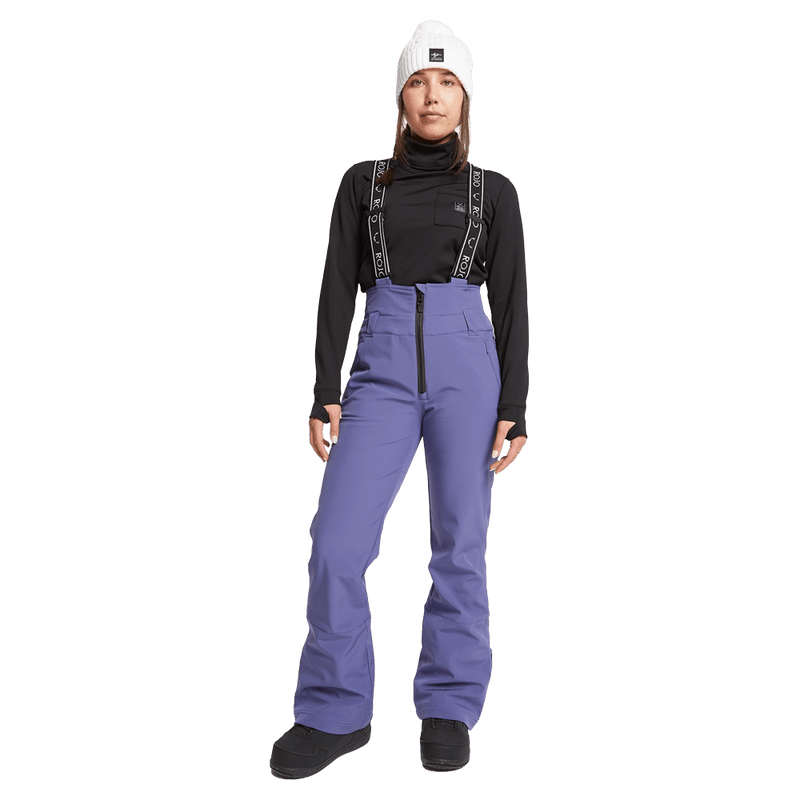 Front view of women wearing theRojo Softshell High Rise Ski Pants - Womens in colour Skipper Blue