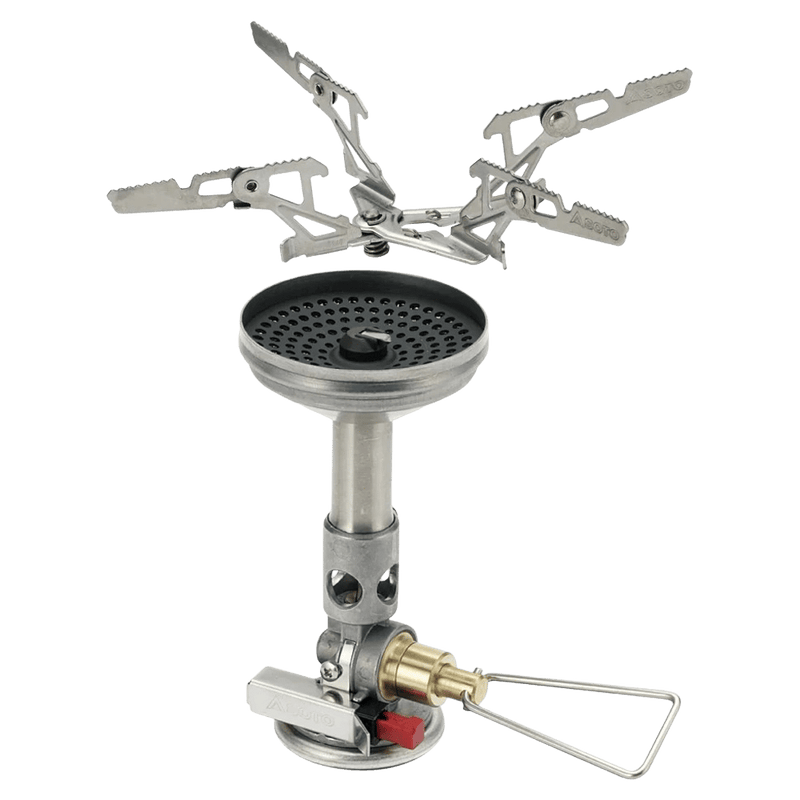Silver Soto Windmaster camping stove with concave burner head and detached 4-prong pot support on a black background.