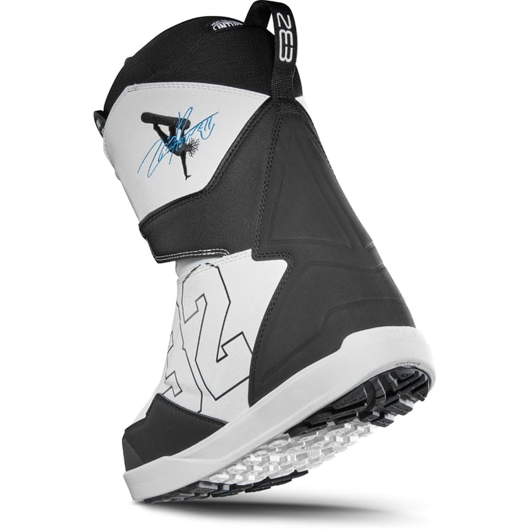 White and black Thirtytwo Lashed Double BOA Snowboard Boots with blue graphics and a large 32 logo on the side.