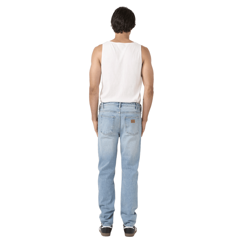 Back view of man in the Rollas Tim Slims Bad Boy Boogie Jeans in colour Mid Blue