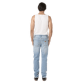 Back view of man in the Rollas Tim Slims Bad Boy Boogie Jeans in colour Mid Blue