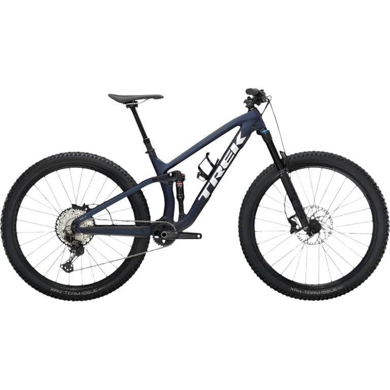 Navy blue Trek Fuel EX 9.7 Gen 5 full suspension mountain bike with white logo and black components in side profile.