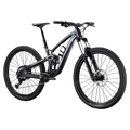 2023 Trek Fuel EX 8 Gen 6 mountain bike with a grey to black gradient frame, full suspension, and knobby tires.