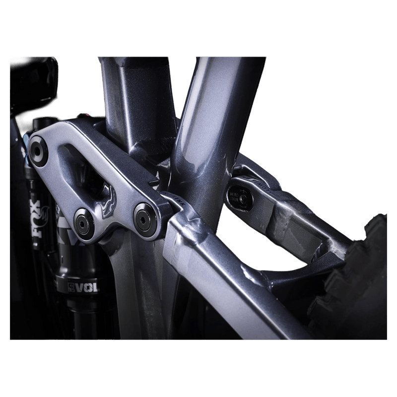 2023 Trek Fuel EX 8 Gen 6 mountain bike with a grey to black gradient frame, full suspension, and knobby tires.