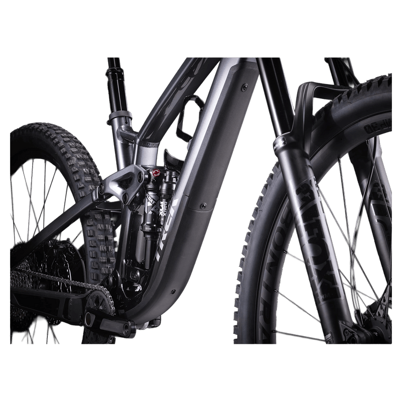 2023 Trek Fuel EX 8 Gen 6 mountain bike with a grey to black gradient frame, full suspension, and knobby tires.
