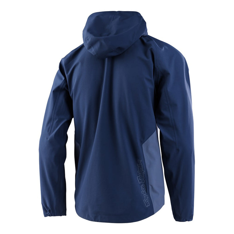 Back view of a navy blue Troy Lee Designs Descent Bike Jacket featuring a hood and light blue side panel with logo.