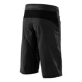 Rear view of black Troy Lee Designs Flowline mountain bike shorts featuring a stretch yoke and logo waistband.