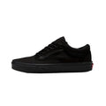 All-black Vans Old Skool low-top sneaker with black canvas upper, side stripe, and rubber sole in a side profile view.