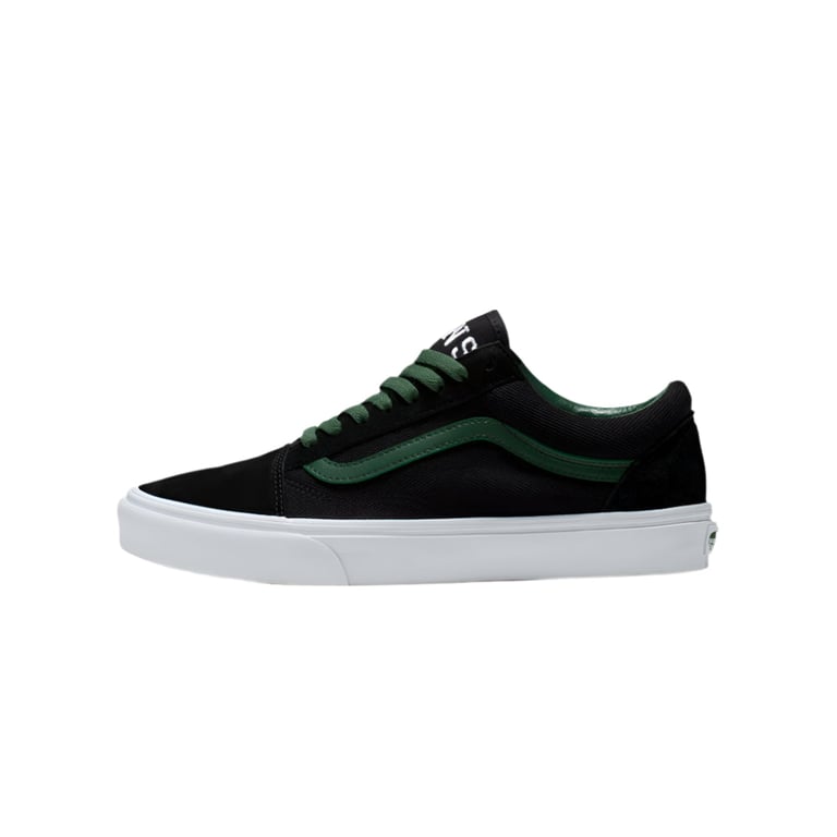 Black Vans Old Skool shoe with green side stripe, green laces, and white rubber sole in a side profile view.