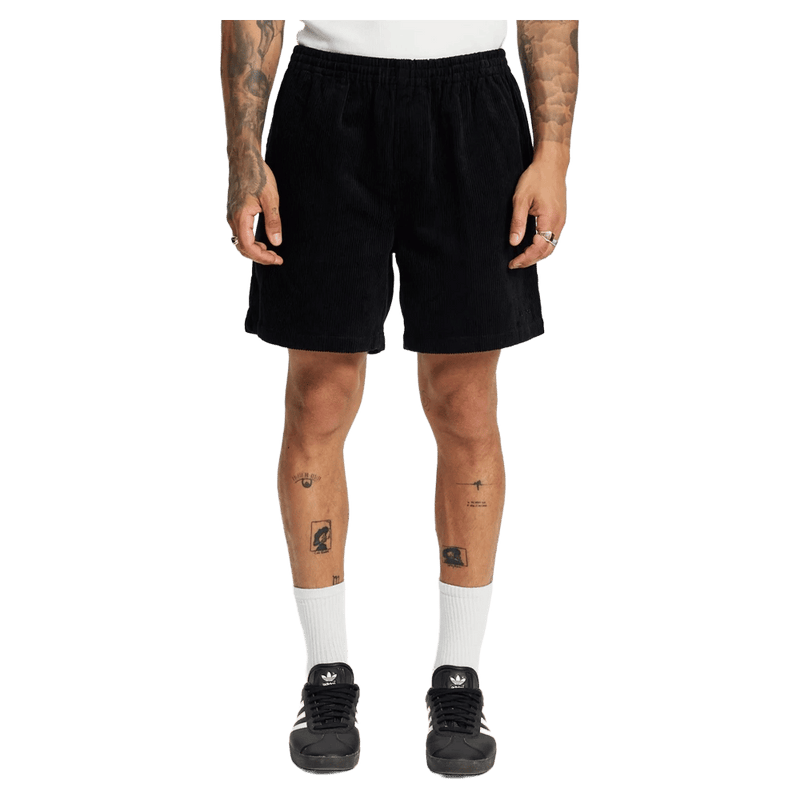 Black X Large 91 Wide Cord Beachshorts with an elastic waistband and corduroy texture on a model.