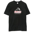Black short-sleeve crew neck t-shirt with a central gorilla graphic and red XLARGE CLOTHING logo on the chest.