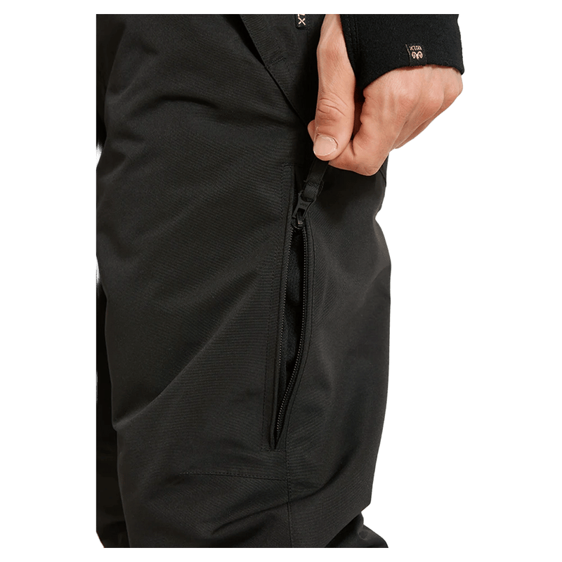 Side view of the XTM Glide II Ski Pants in Black colourway, men's model