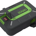 Rugged black and green Zoleo Satellite Communicator with a red SOS button and LED status indicators.